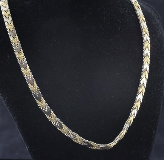 An Italian Chimento 18ct textured two colour gold necklace, 17in.